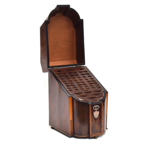 228 - A George III mahogany and cross banded serpentine knife box, opening to the original fitted interior... 