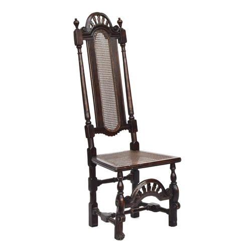 370 - A William & Mary oak side chair, caned back and seat, the back 128cm high, the seat 42cm high