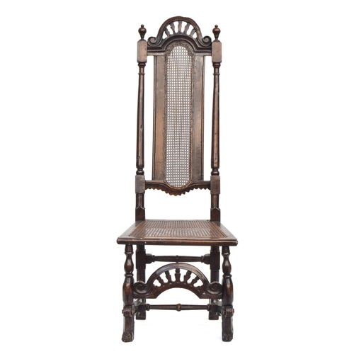 370 - A William & Mary oak side chair, caned back and seat, the back 128cm high, the seat 42cm high