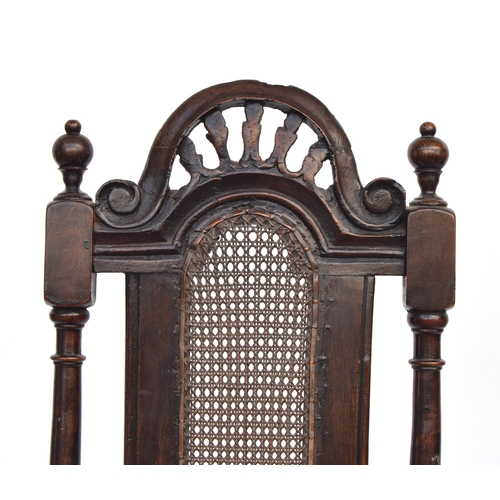 370 - A William & Mary oak side chair, caned back and seat, the back 128cm high, the seat 42cm high