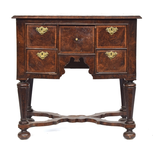 373 - A William & Mary walnut and cross and featherbanded lowboy, the moulded top over five drawers, on ta... 