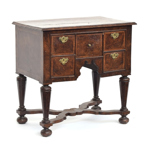 373 - A William & Mary walnut and cross and featherbanded lowboy, the moulded top over five drawers, on ta... 