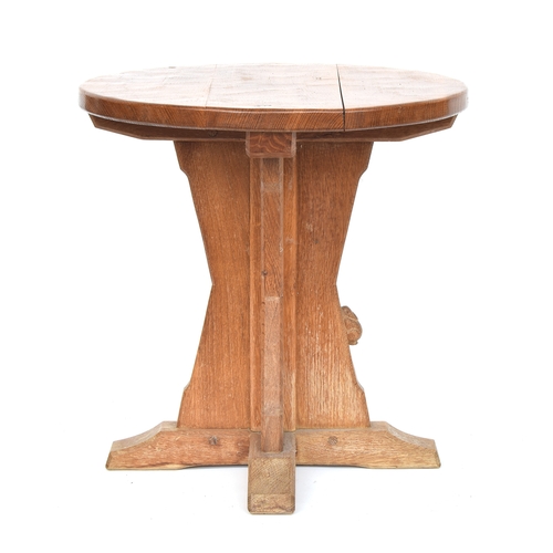 450 - Peter 'Rabbitman' Heap (ex-Mouseman), a circular oak occasional table, the X support with carved rab... 