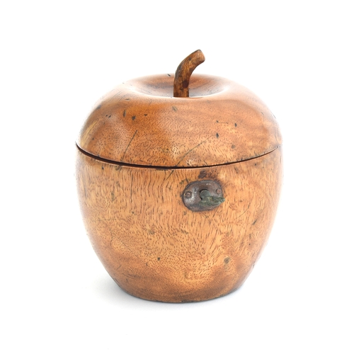 225 - A treen fruitwood tea caddy in the form of an apple, the hinged lid with stalk finial, approx. 11.5c... 