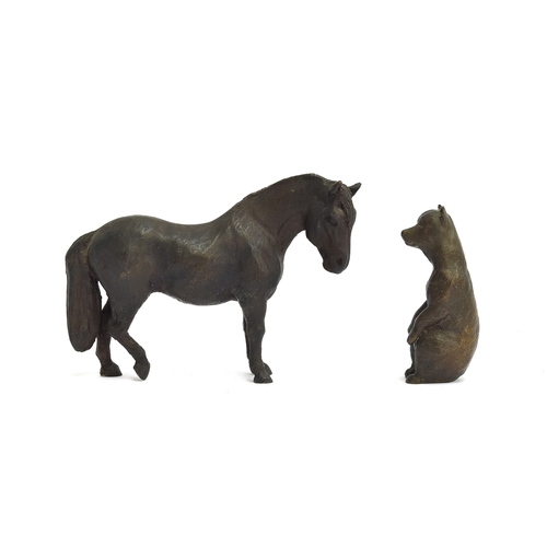 261 - A small bronze sculpture of a horse, 9.5cm high ; together with a 20th century bronze bear mascot, 8... 