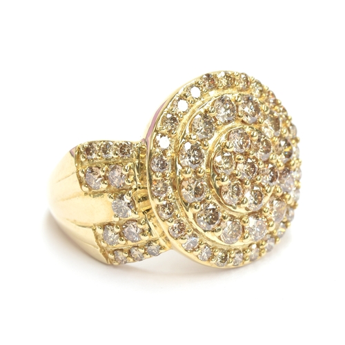 67 - A 9ct gold target cluster ring set with Argyle diamonds totalling 2cts, size N 1/2, 6.1g

Provenance... 