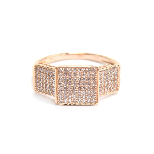 74 - A 9ct rose gold panel ring set with approx. 0.5cts of pink diamonds, size O 1/2, 2.2g

Provenance: p... 