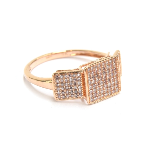 74 - A 9ct rose gold panel ring set with approx. 0.5cts of pink diamonds, size O 1/2, 2.2g

Provenance: p... 