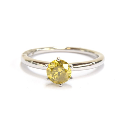 50 - A platinum mounted yellow canary diamond solitaire ring, the diamond weighing 1ct, size R 1/2, 4.6g
... 