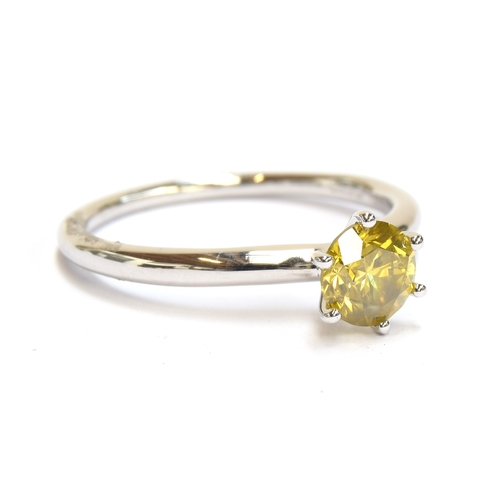 50 - A platinum mounted yellow canary diamond solitaire ring, the diamond weighing 1ct, size R 1/2, 4.6g
... 