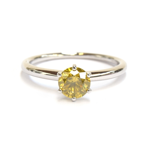 51 - A platinum mounted yellow canary diamond solitaire ring, the diamond weighing 1ct, size S, 4.6g

Pro... 