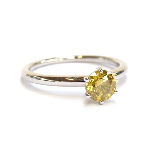 51 - A platinum mounted yellow canary diamond solitaire ring, the diamond weighing 1ct, size S, 4.6g

Pro... 