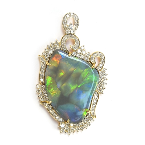 86 - An 18ct gold mounted lightning ridge black opal and diamond pendant, the opal 24.19cts, the diamonds... 