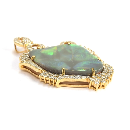 86 - An 18ct gold mounted lightning ridge black opal and diamond pendant, the opal 24.19cts, the diamonds... 