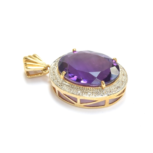 87 - A 9ct gold mounted Siberian amethyst and white sapphire pendant, the oval cut amethyst 14.1cts, 2.6c... 