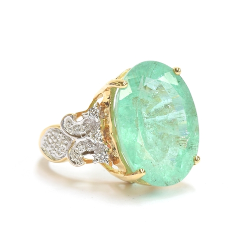 81 - An 18ct gold Brazilian paraiba tourmaline and diamond ring, the large tourmaline weighing 17.87cts a... 