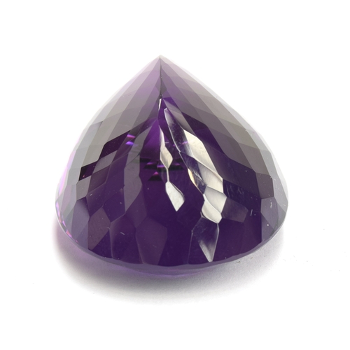 112 - A large unmounted Lusaka Amethyst, the oval faceted stone weighing 168.6cts, measuring 40x32mm, purc... 