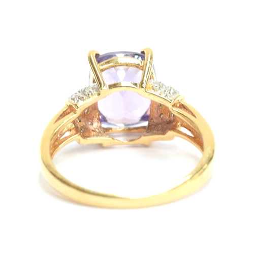 108 - An 18ct gold pink tanzanite and diamond ring, the tanzanite 4.36cts and measuring 10.5x8.5mm, size N... 