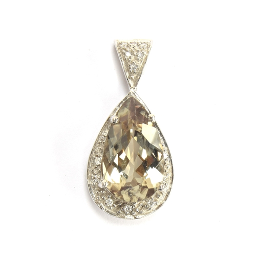 89 - An 18ct white gold, zultanite and diamond pendant, the pear cut zultanite 4.5cts and measuring 15x9m... 