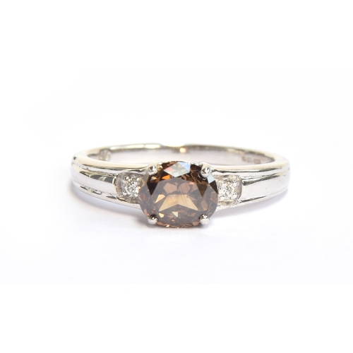 56 - An 18ct white gold and Argyle brown diamond ring, size N 1/2,  gross weight 3.9g, purchased by the v... 