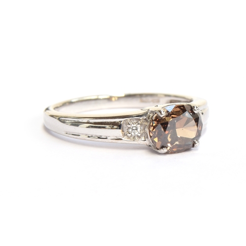 56 - An 18ct white gold and Argyle brown diamond ring, size N 1/2,  gross weight 3.9g, purchased by the v... 