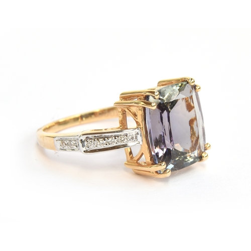 102 - A 14ct gold bicolour tanzanite and diamond ring, the cushion cut tanzanite 5cts and measuring 11.2x1... 