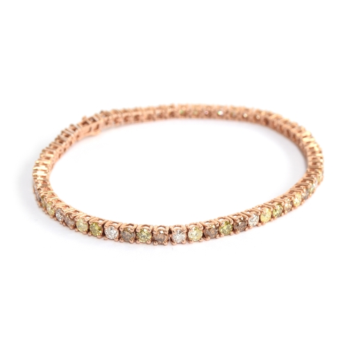 91 - A 14ct rose gold diamond tennis bracelet set with champagne, green, yellow and pink diamonds totalli... 