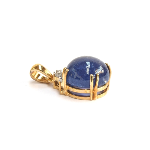 106 - A 9ct gold mounted tanzanite cabochon and natural white zircon pendant, the tanzanite 9.4cts and 12x... 