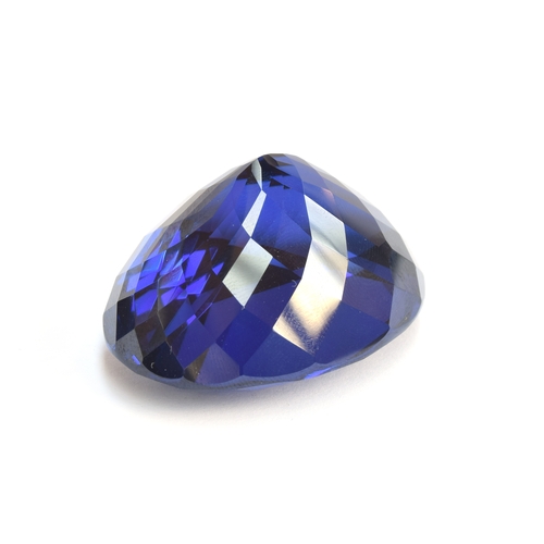 110 - An exceptional unmounted tanzanite weighing 135cts, oval modified brilliant cut, accompanied with IG... 