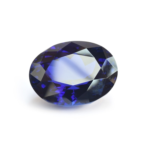 110 - An exceptional unmounted tanzanite weighing 135cts, oval modified brilliant cut, accompanied with IG... 