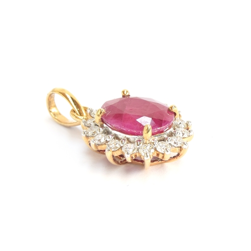 116 - An 18ct gold, ruby and diamond pendant, the Burmese ruby 3.5cts, with 0.5cts of diamonds, 1.7cm long... 