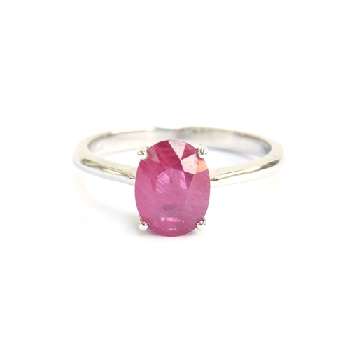 115 - A platinum and ruby solitaire ring, the Burmese ruby 2.2cts and measuring 9x7mm, size P 1/2, gross w... 