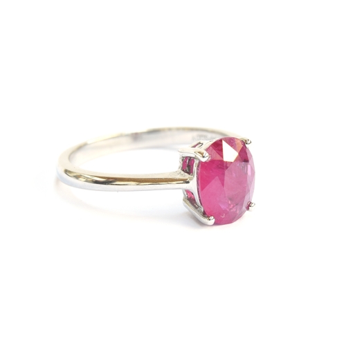 115 - A platinum and ruby solitaire ring, the Burmese ruby 2.2cts and measuring 9x7mm, size P 1/2, gross w... 