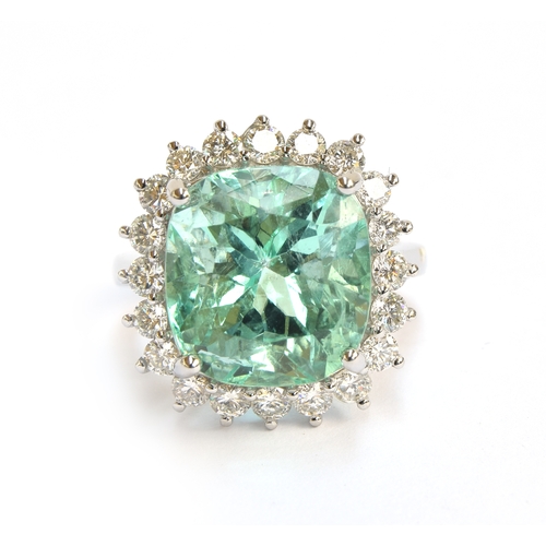 37 - A platinum, emerald and diamond cluster ring, the Boyaca Colombian emerald weighing 11cts and measur... 