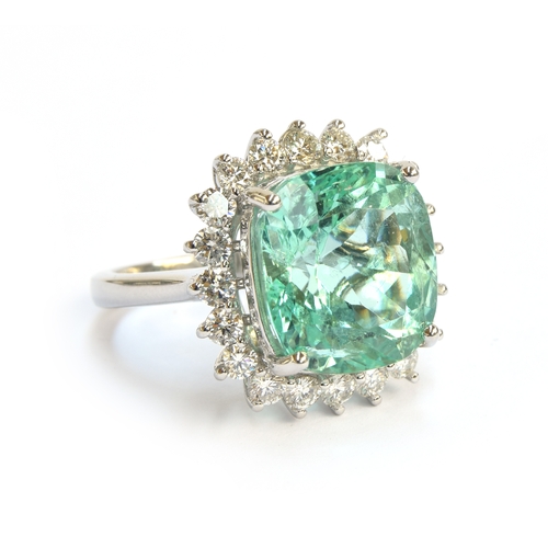 37 - A platinum, emerald and diamond cluster ring, the Boyaca Colombian emerald weighing 11cts and measur... 