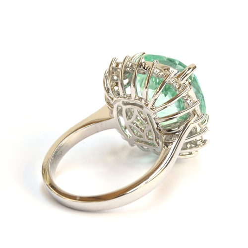 37 - A platinum, emerald and diamond cluster ring, the Boyaca Colombian emerald weighing 11cts and measur... 