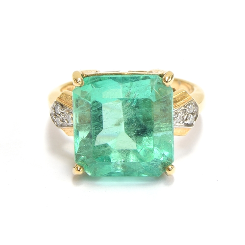 39 - An 18ct gold, emerald and diamond ring, the Muzo Colombian emerald 8.69cts and 12.5x12mm, size N 1/2... 