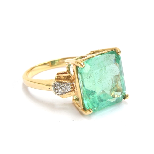 39 - An 18ct gold, emerald and diamond ring, the Muzo Colombian emerald 8.69cts and 12.5x12mm, size N 1/2... 