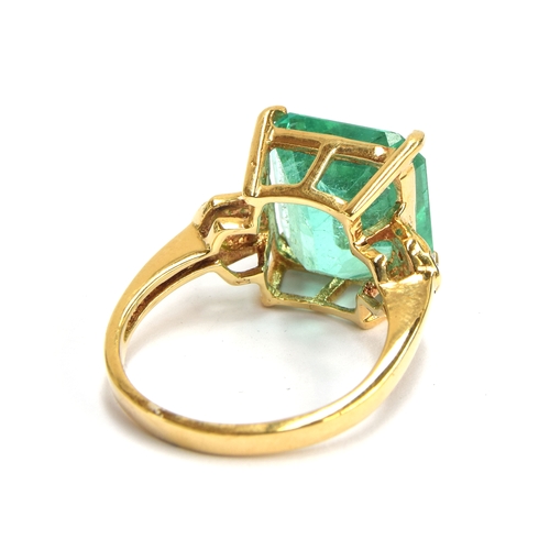 39 - An 18ct gold, emerald and diamond ring, the Muzo Colombian emerald 8.69cts and 12.5x12mm, size N 1/2... 