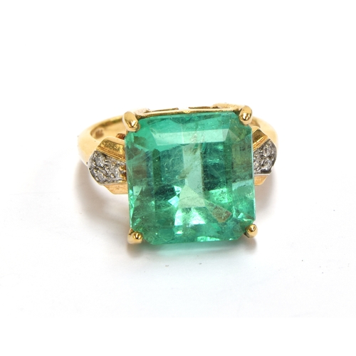 39 - An 18ct gold, emerald and diamond ring, the Muzo Colombian emerald 8.69cts and 12.5x12mm, size N 1/2... 