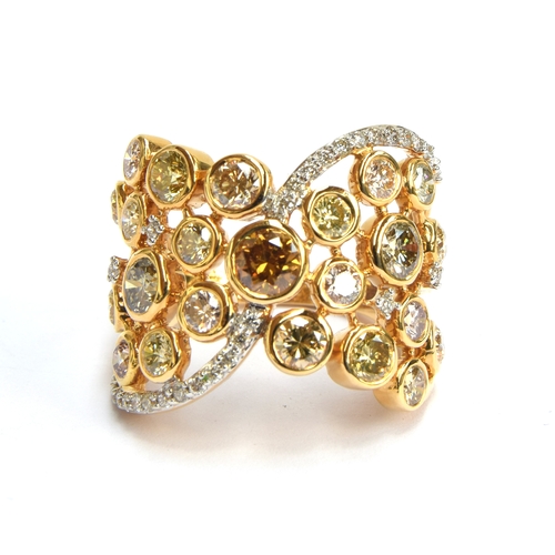 66 - An 18ct gold and diamond ring, the multicoloured diamonds totalling approx. 3cts, size N 1/2, gross ... 