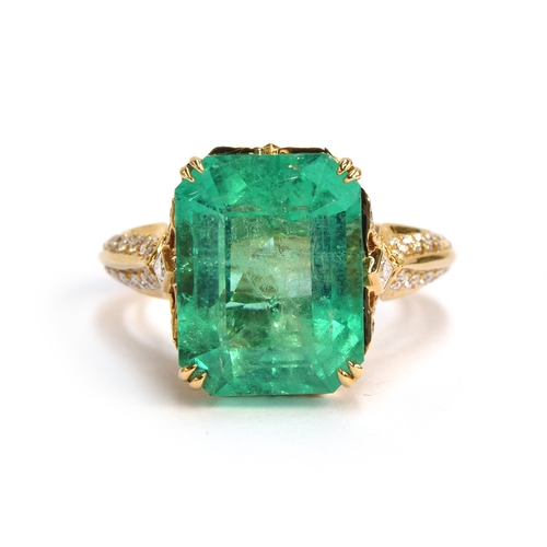 123 - A Kat Florence 18ct gold, emerald and diamond ring, the Muzo Colombian emerald 9.69cts and measuring... 