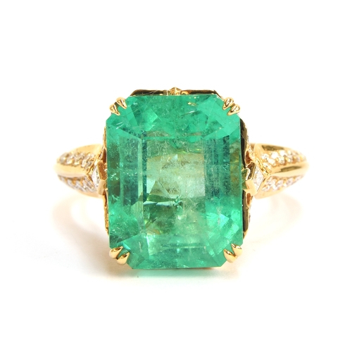 123 - A Kat Florence 18ct gold, emerald and diamond ring, the Muzo Colombian emerald 9.69cts and measuring... 