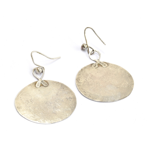 22 - Breon O'Casey (1928-2011) A pair of hammered silver earrings, hallmarked B.O.C, Birmingham 1975