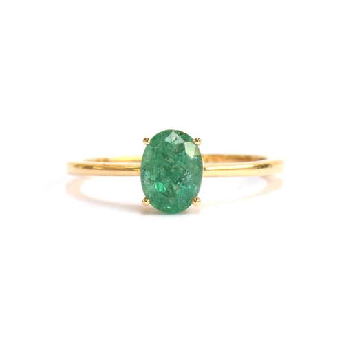 44 - A 14ct gold and emerald solitaire ring, the oval cut Zambian emerald 1.2cts and 8x6mm, size S, gross... 