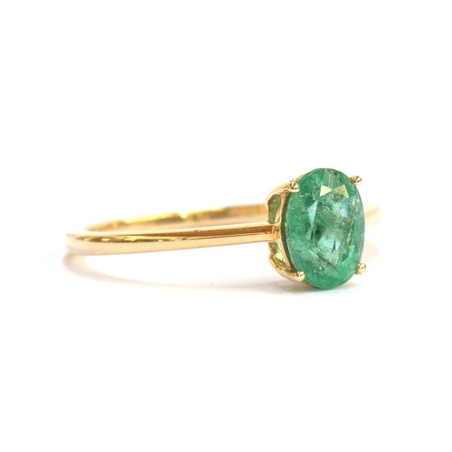 44 - A 14ct gold and emerald solitaire ring, the oval cut Zambian emerald 1.2cts and 8x6mm, size S, gross... 