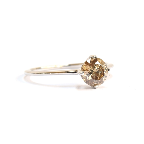 53 - An 18ct white gold Australian diamond solitaire ring, the fancy champagne coloured diamond 1.05cts, ... 