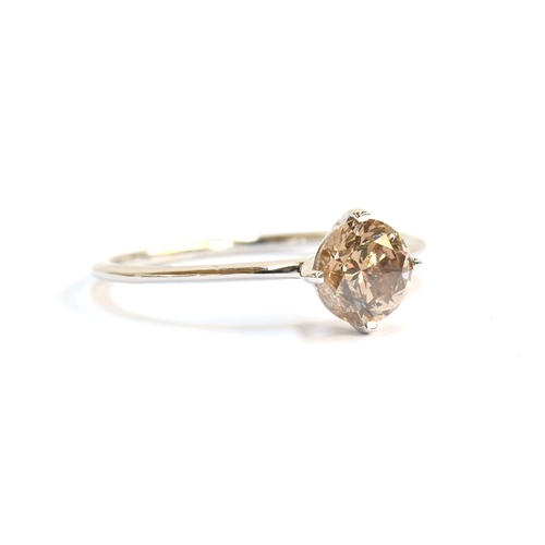 54 - An 18ct white gold Australian diamond solitaire ring, the fancy champagne coloured diamond 1.05cts, ... 