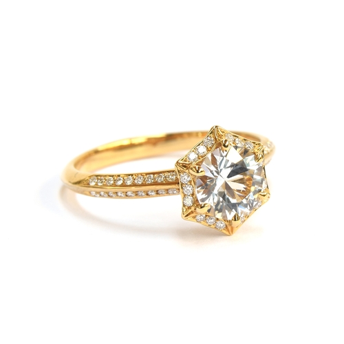 129 - A Kat Florence 18ct gold, white sapphire and diamond hexagonal cluster ring, the Ceylon white sapphi... 