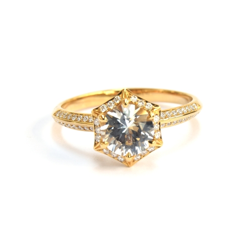 129 - A Kat Florence 18ct gold, white sapphire and diamond hexagonal cluster ring, the Ceylon white sapphi... 